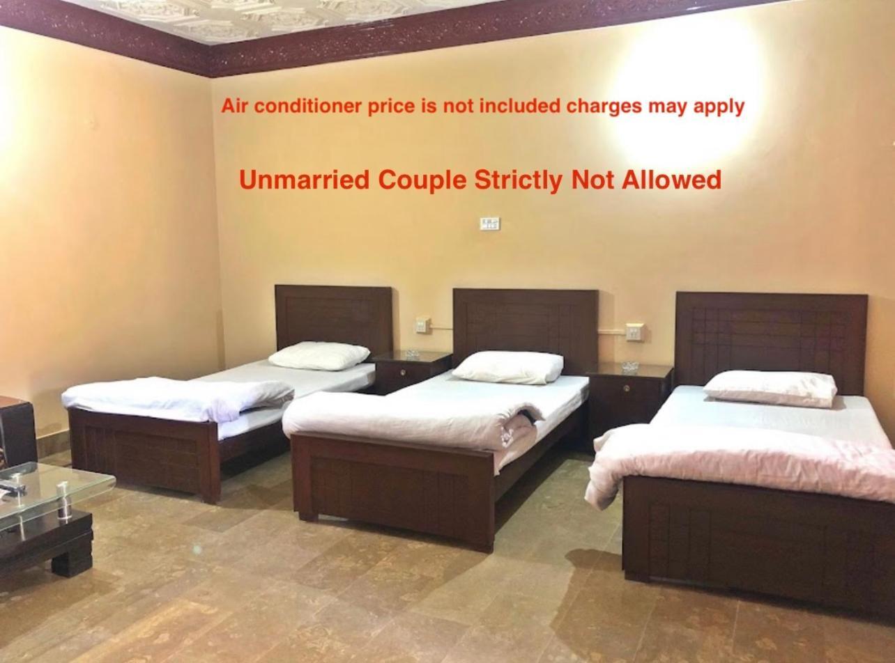 Hotel Babar House Faisalabad Esterno foto